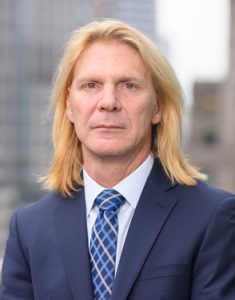 San Razzano new york injury attorney on new york city rooftop