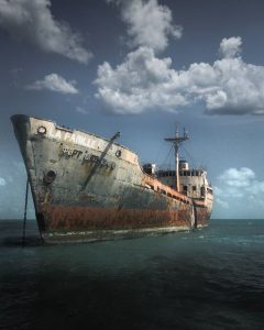 old abandoned ship in the water