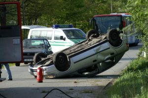 car flipped over in the street