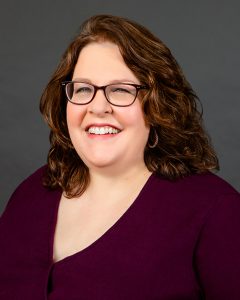 erin hrly smiling headshot