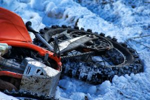 motorcycle tipped over in the snow
