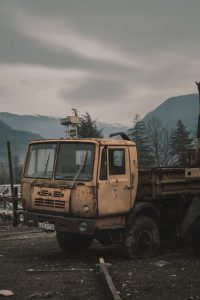 construction vehicle parked in a dirt lot
