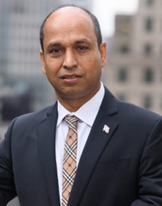 moin choudhury in black suit headshot