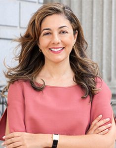 roya injury attorney in pink shirt