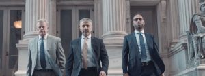 omrani and taub team walking down staircase