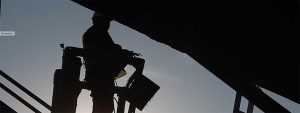 construction worker silhouette on a lift