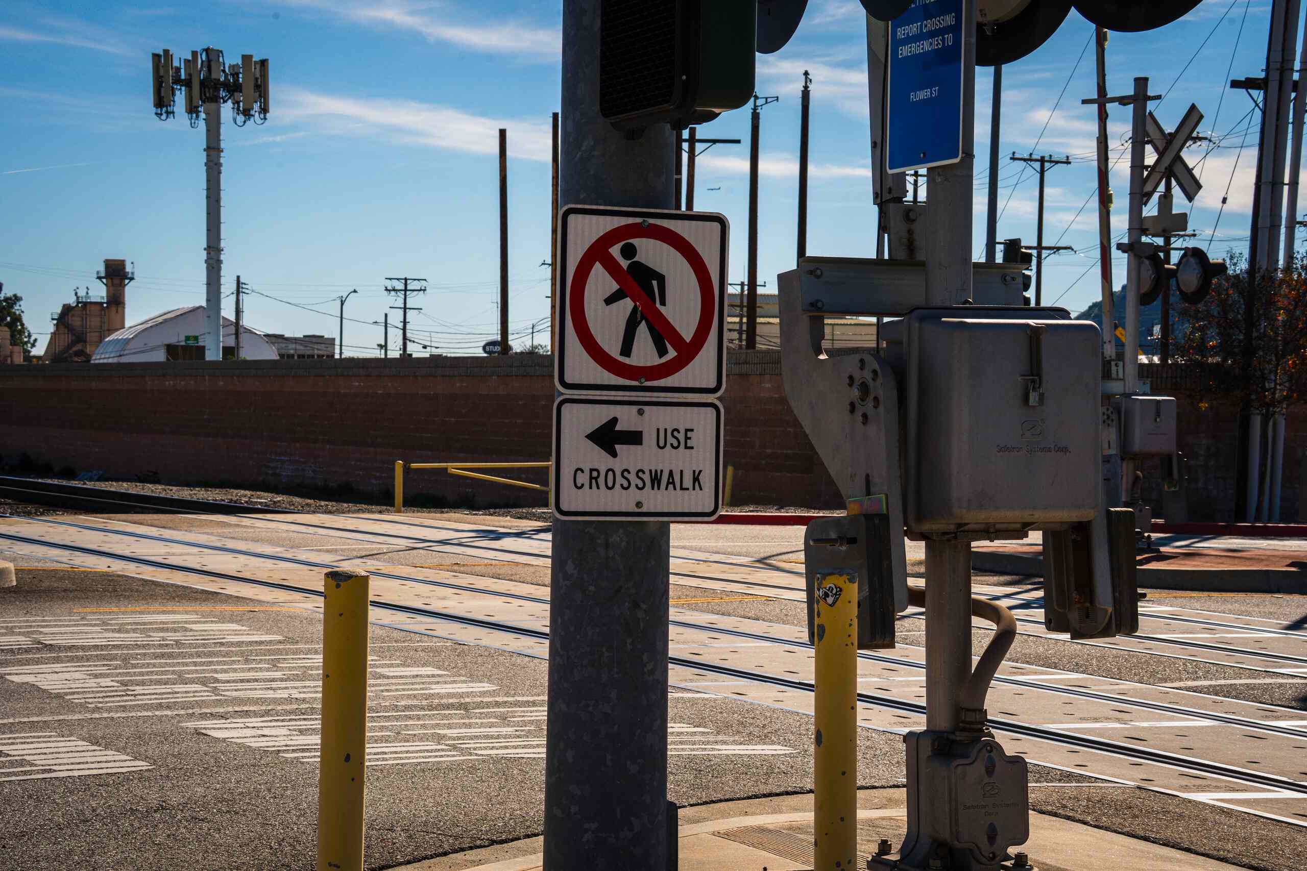 Heavy traffic in New York City with pedestrians nearby, highlighting the role of comparative negligence in NYC jaywalking injury cases.