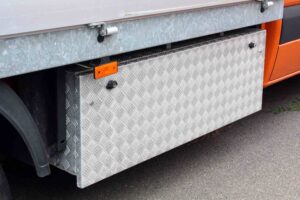 Close-up of a commercial vehicle's exterior compartment, illustrating the need for a "Spoliation Letter" to protect black box data after a New York truck accident.