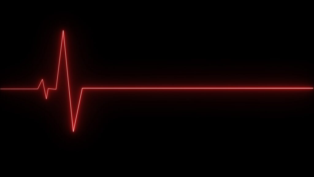 A flatline heartbeat monitor graphic represents the legal distinctions between a Wrongful Death vs. Survival Action in New York.